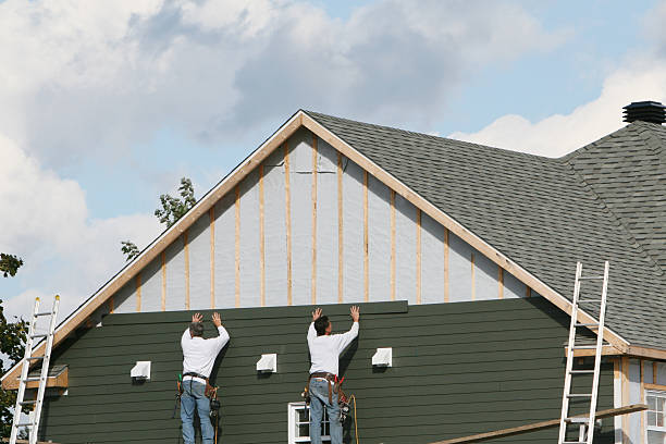 Professional Emergency Siding Repair technician working in Elon, NC